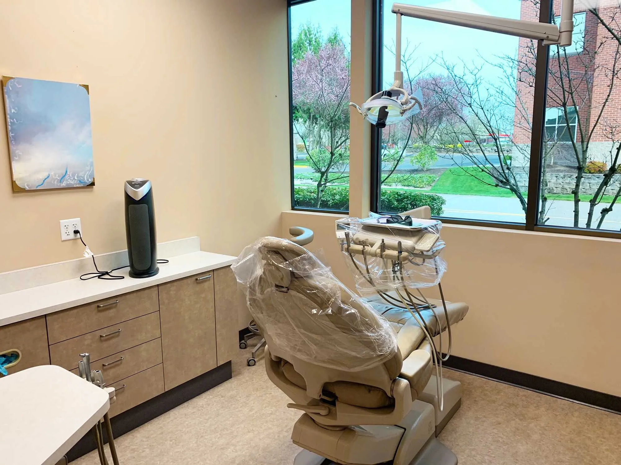 Treatment room with patient chair and overhead light